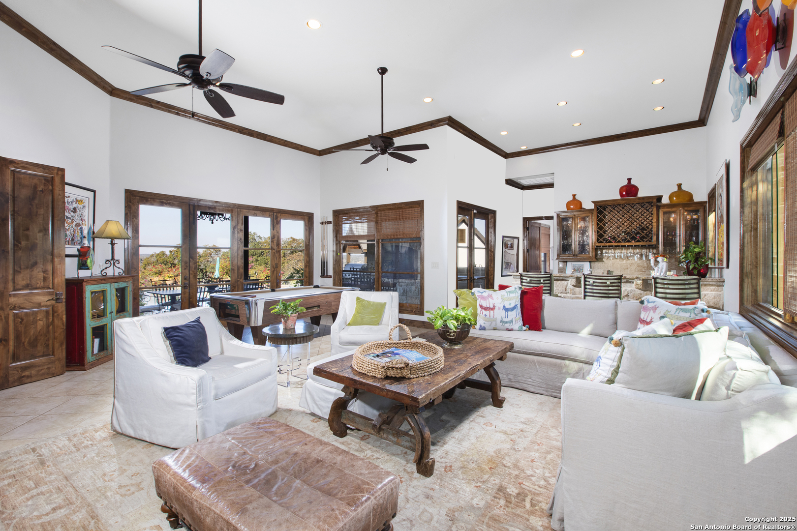165 Painted Sky Comfort, TX 78013 - Photo 41 of 49 a living room with furniture ceiling fan and a large window