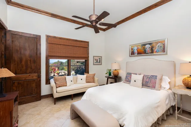 a bathroom with a granite countertop sink a mirror and a bathtub
