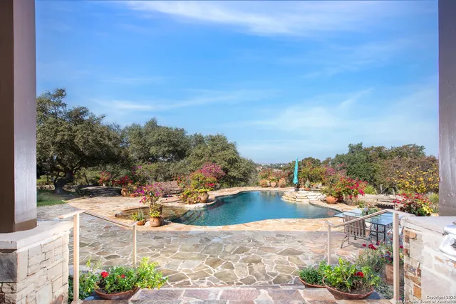 a view of a swimming pool and outdoor space