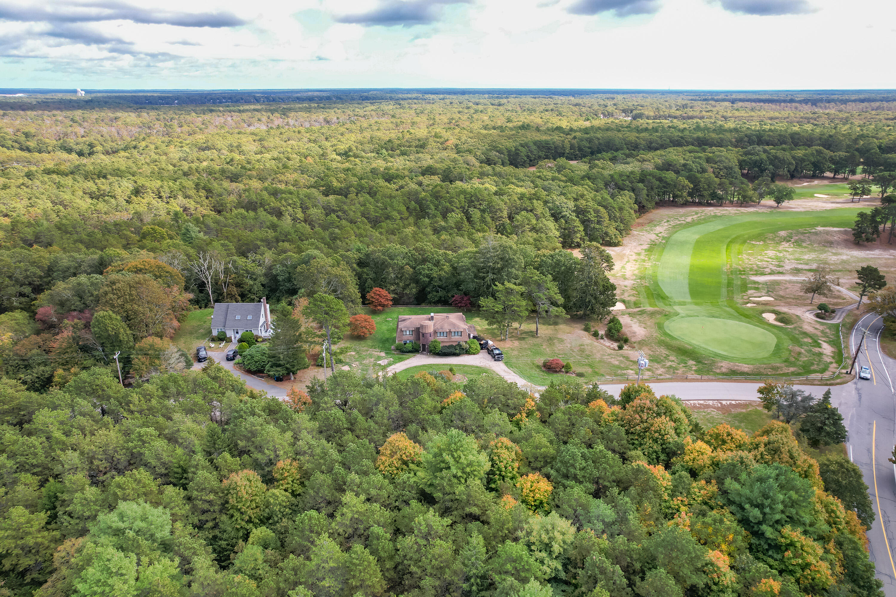 11 Ranch Road East Falmouth, MA 02536 - Photo 2 of 8 an aerial view of residential houses with outdoor space and trees