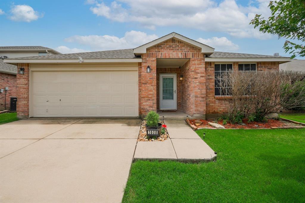 1608 Carolina Ridge Way Fort Worth, TX 76247 - Photo 1 of 1 a front view of a house with a yard