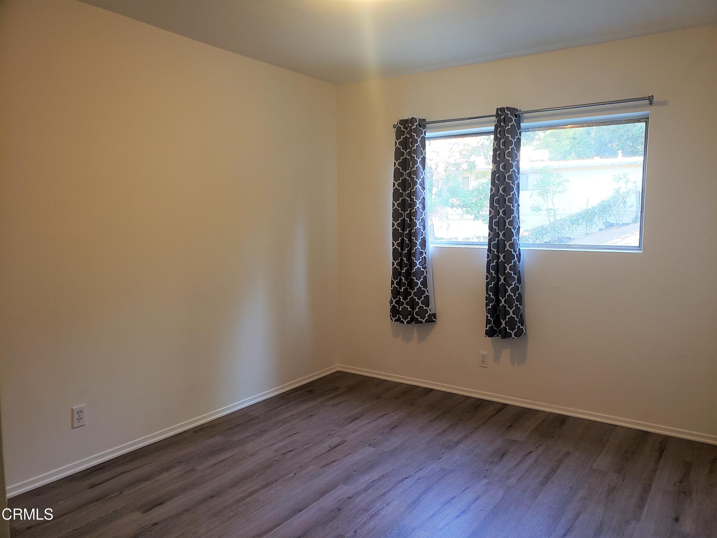 7143 Hillrose Street Tujunga, CA 91042 - Photo 11 of 13 an empty room with a window