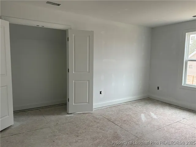 a picture of a room with a window