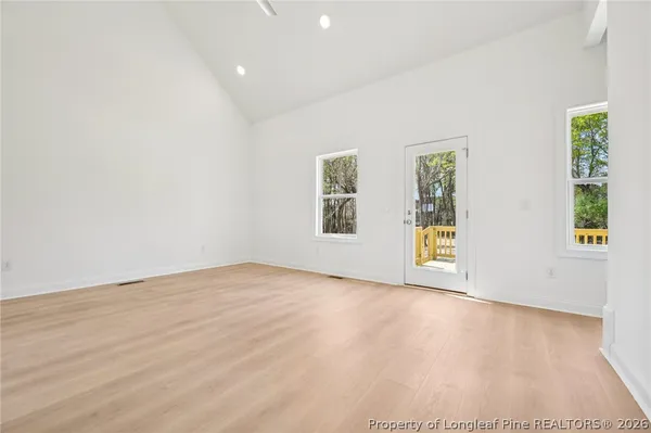 an empty room with windows