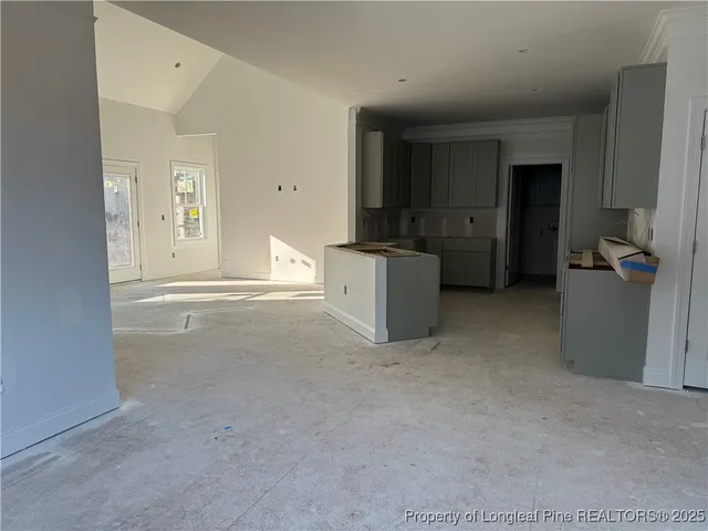 a view of livingroom with furniture and cabinet
