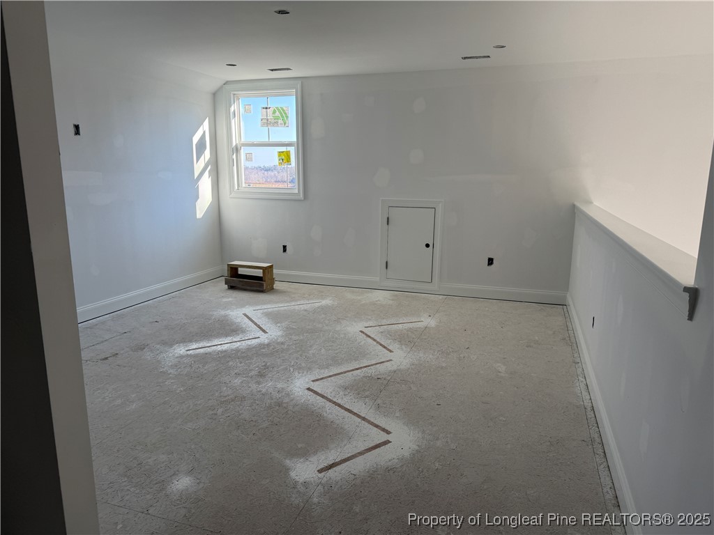 3205 Leaflet Church Road Broadway, NC 27505 - Photo 8 of 12 a view of an empty room