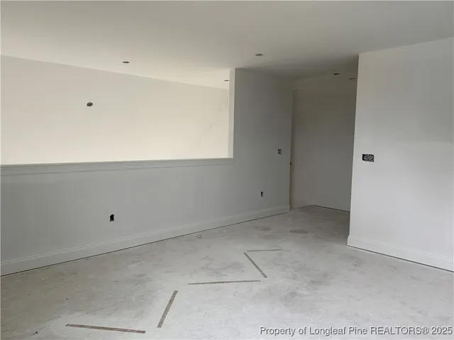 a view of a room with an empty space