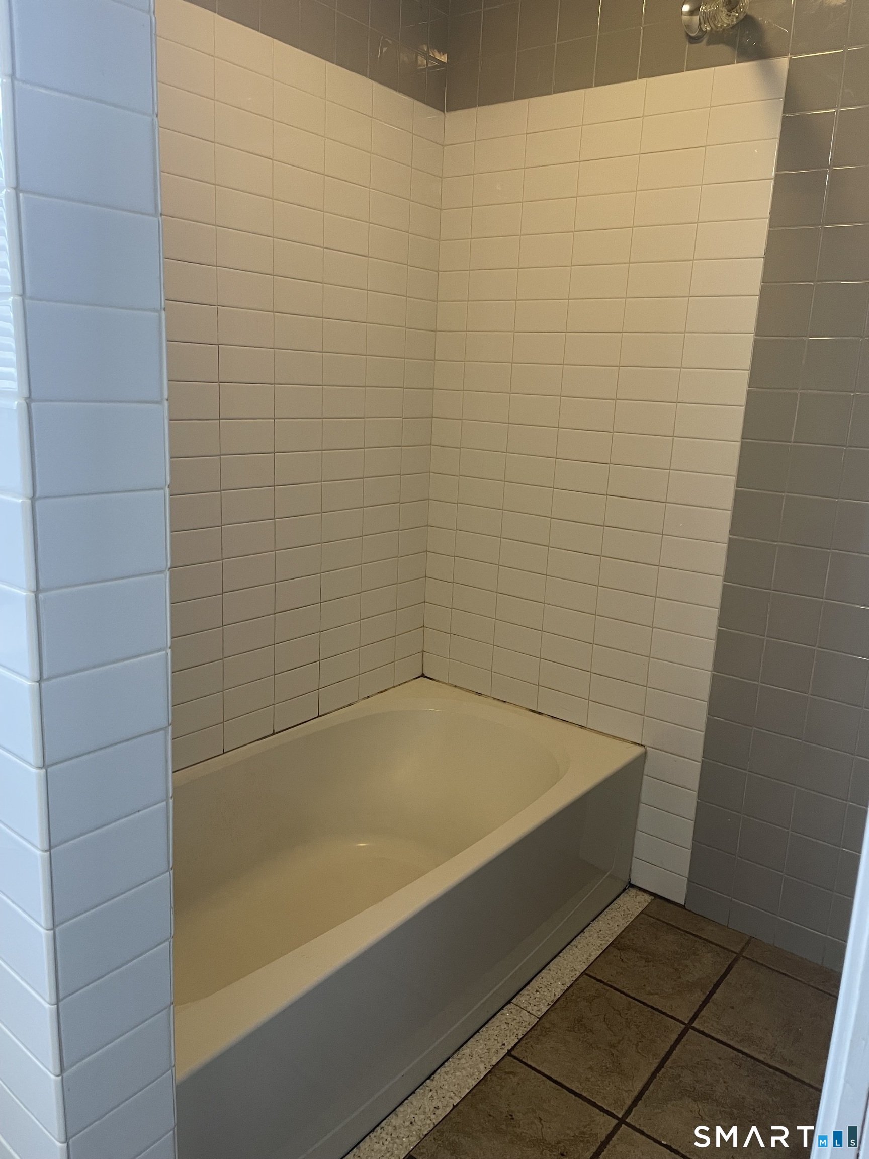 227 Arctic Street Bridgeport, CT 06608 - Photo 13 of 19 a bathroom with a bathtub
