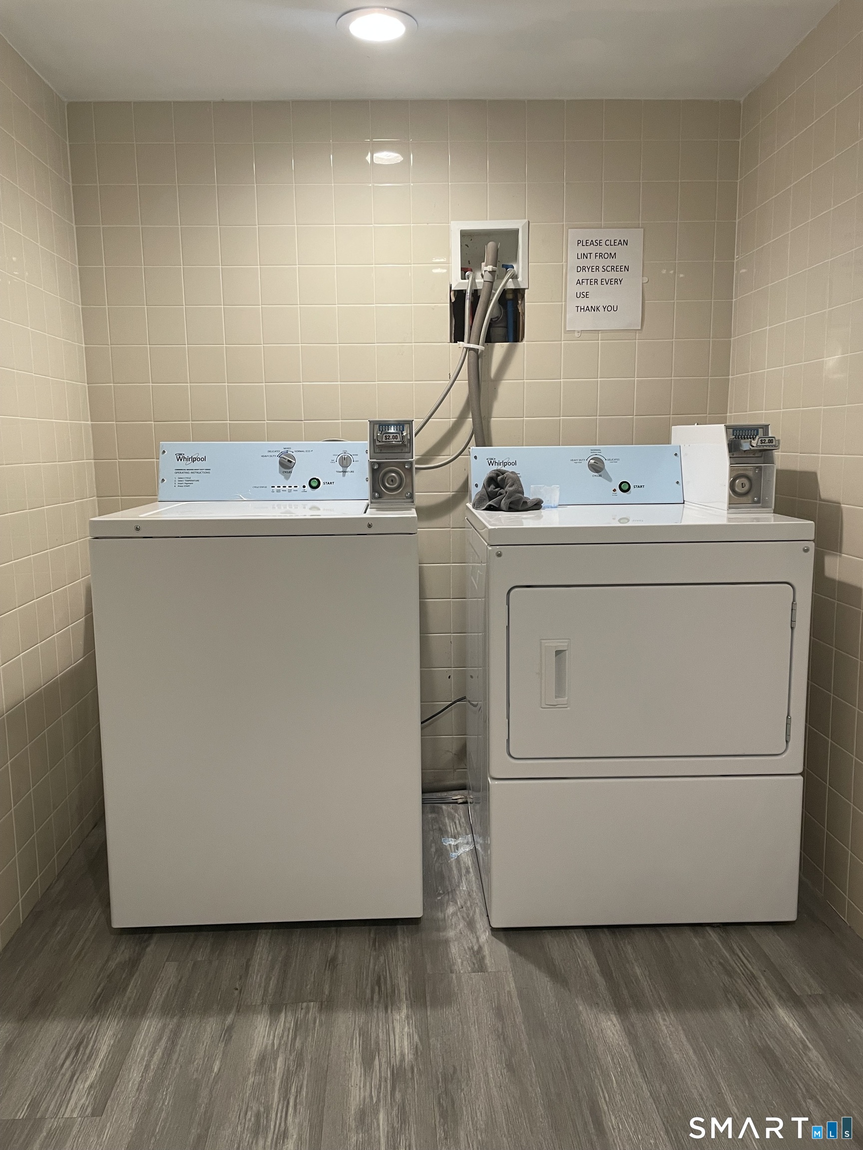 227 Arctic Street Bridgeport, CT 06608 - Photo 17 of 19 a utility room with dryer and washer