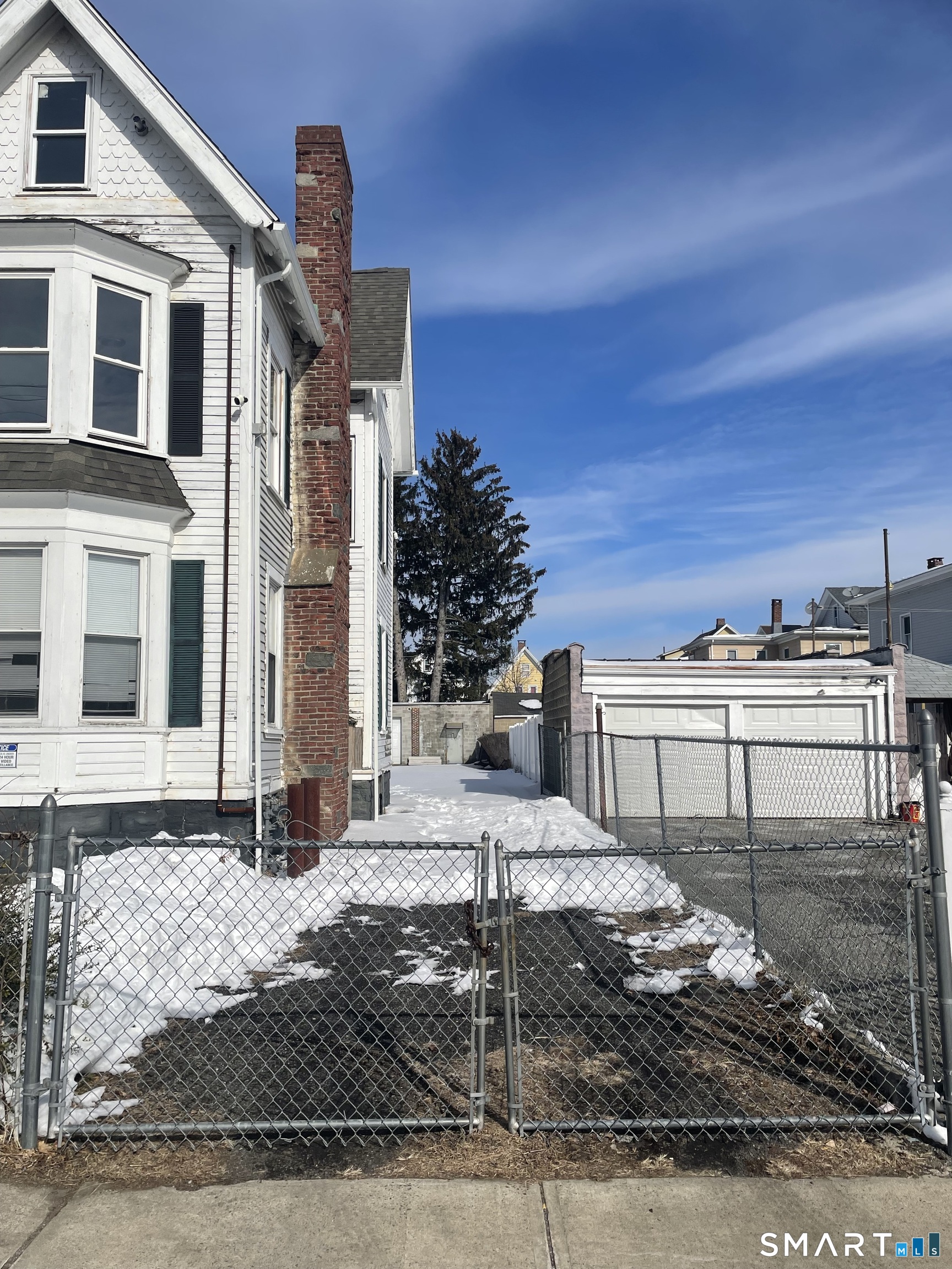 227 Arctic Street Bridgeport, CT 06608 - Photo 19 of 19 a street view along with residential houses