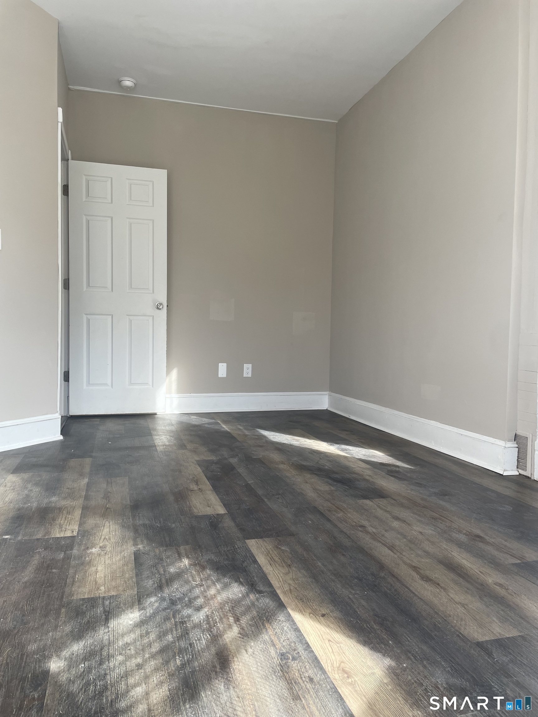 227 Arctic Street Bridgeport, CT 06608 - Photo 6 of 19 a view of room with window