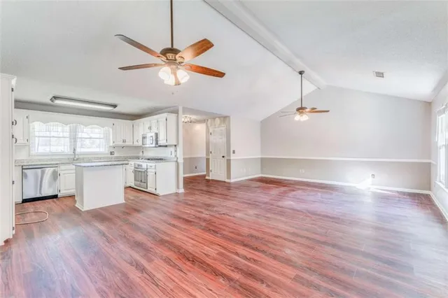 a view of a house with a back yard