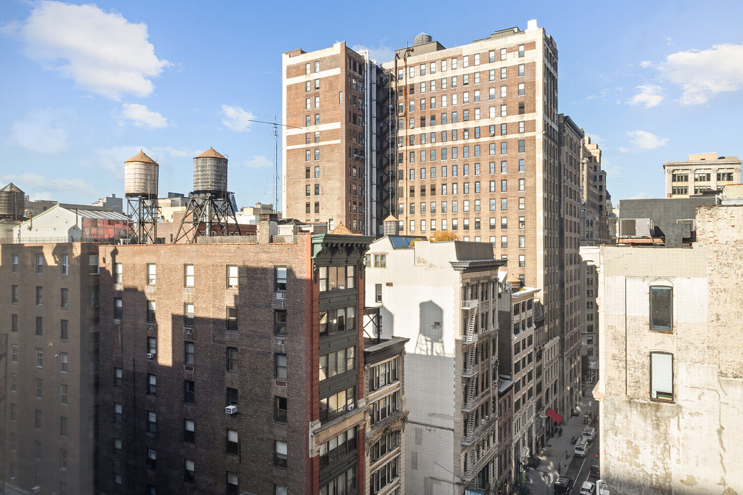 49 East 21st Street, Unit 11B Manhattan, NY 10010 - Photo 10 of 12 a view of a city with tall buildings