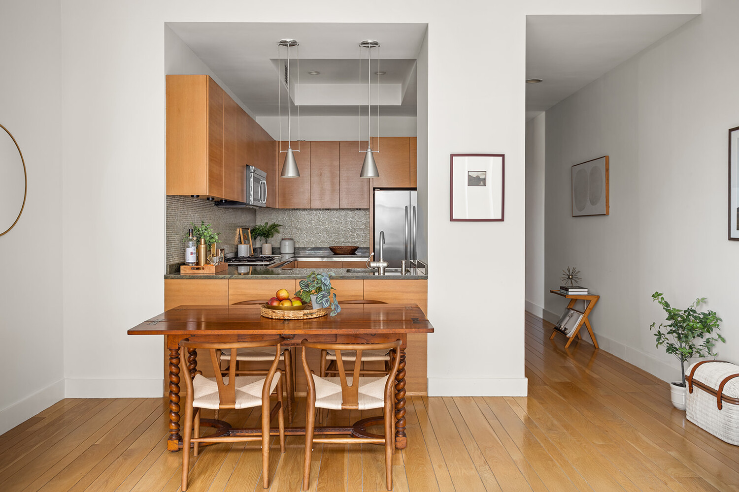 49 East 21st Street, Unit 11B Manhattan, NY 10010 - Photo 4 of 12 a dining room with furniture and wooden floor