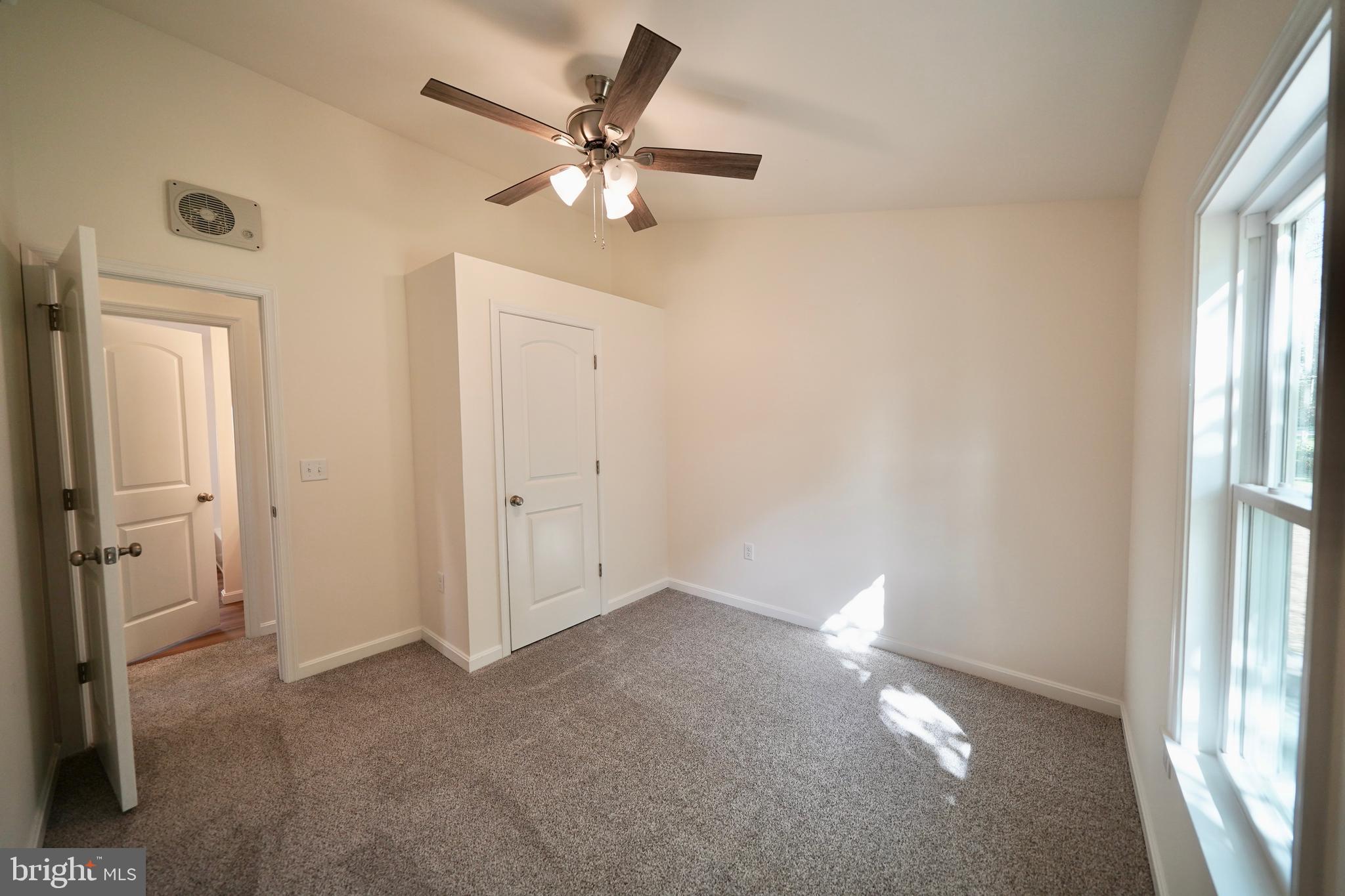 1465 Millington Road Clayton, DE 19938 - Photo 15 of 31 a view of an empty room with a window