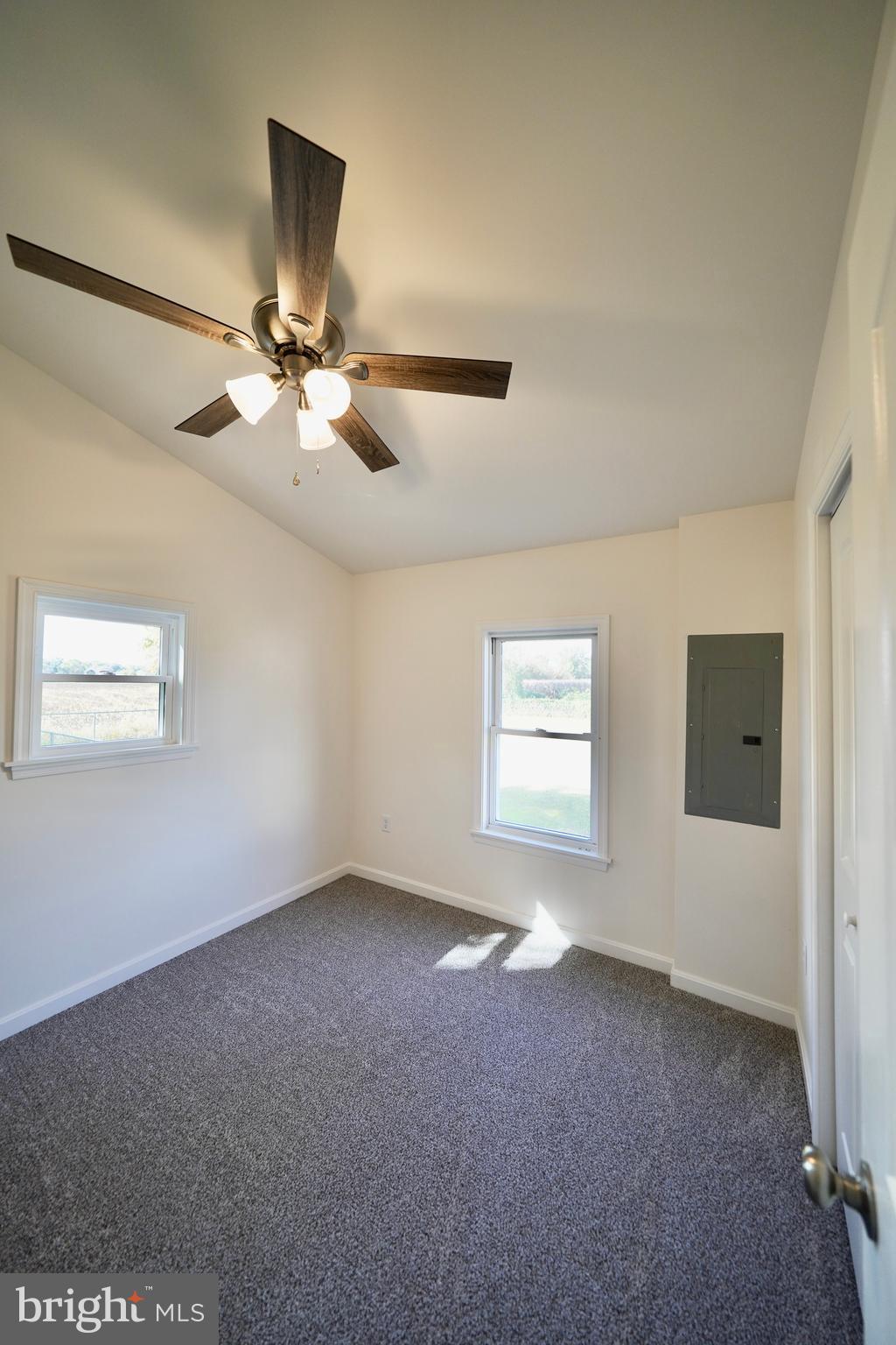 1465 Millington Road Clayton, DE 19938 - Photo 21 of 31 a view of a livingroom with a ceiling fan and window