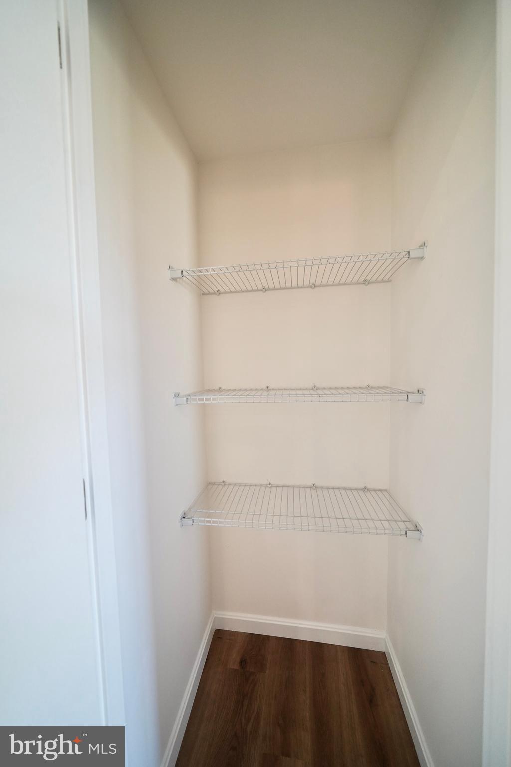 1465 Millington Road Clayton, DE 19938 - Photo 23 of 31 a view of a room with racks on the wall