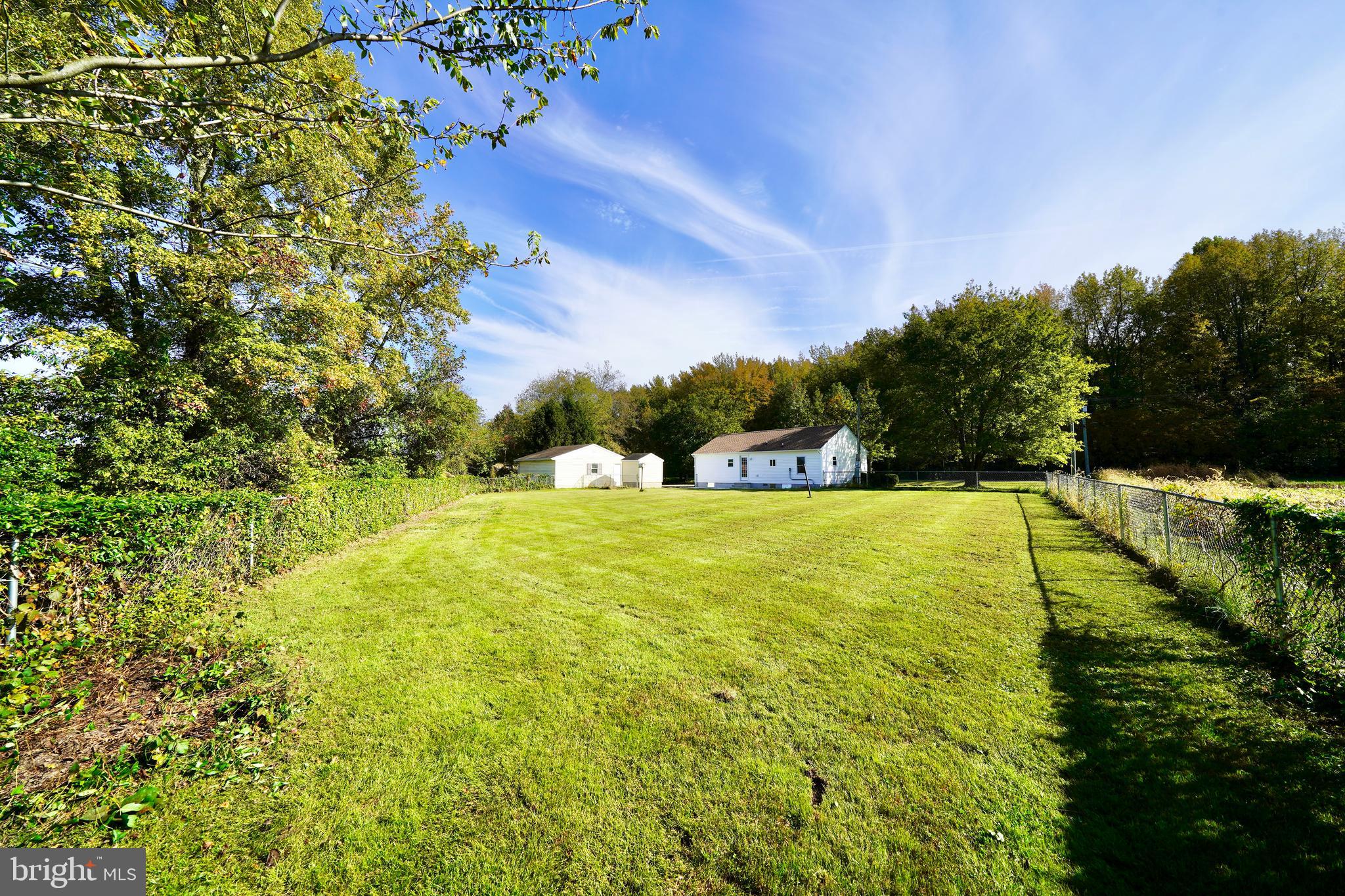 1465 Millington Road Clayton, DE 19938 - Photo 26 of 31 a view of swimming pool with an outdoor space