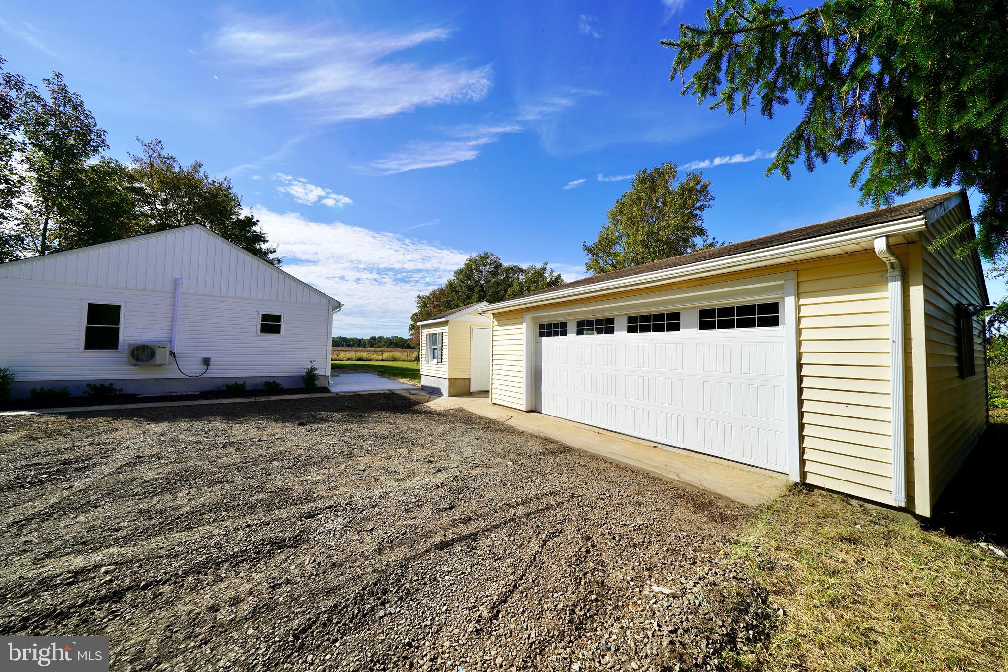 1465 Millington Road Clayton, DE 19938 - Photo 29 of 31 a view of a house with a backyard
