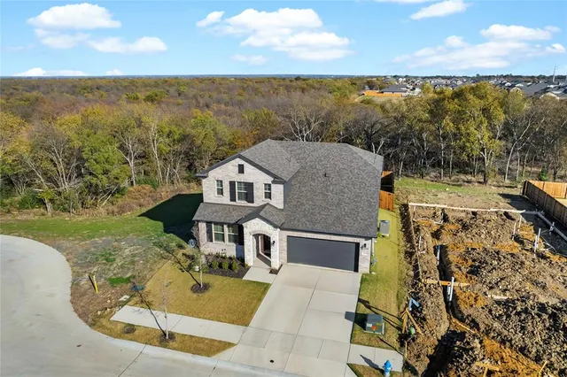 swimming pool view with a lake view