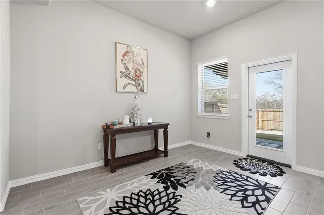 a room with painting and a table