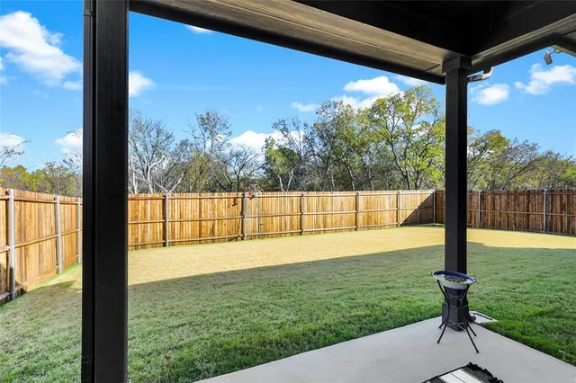 a view of a yard from a window