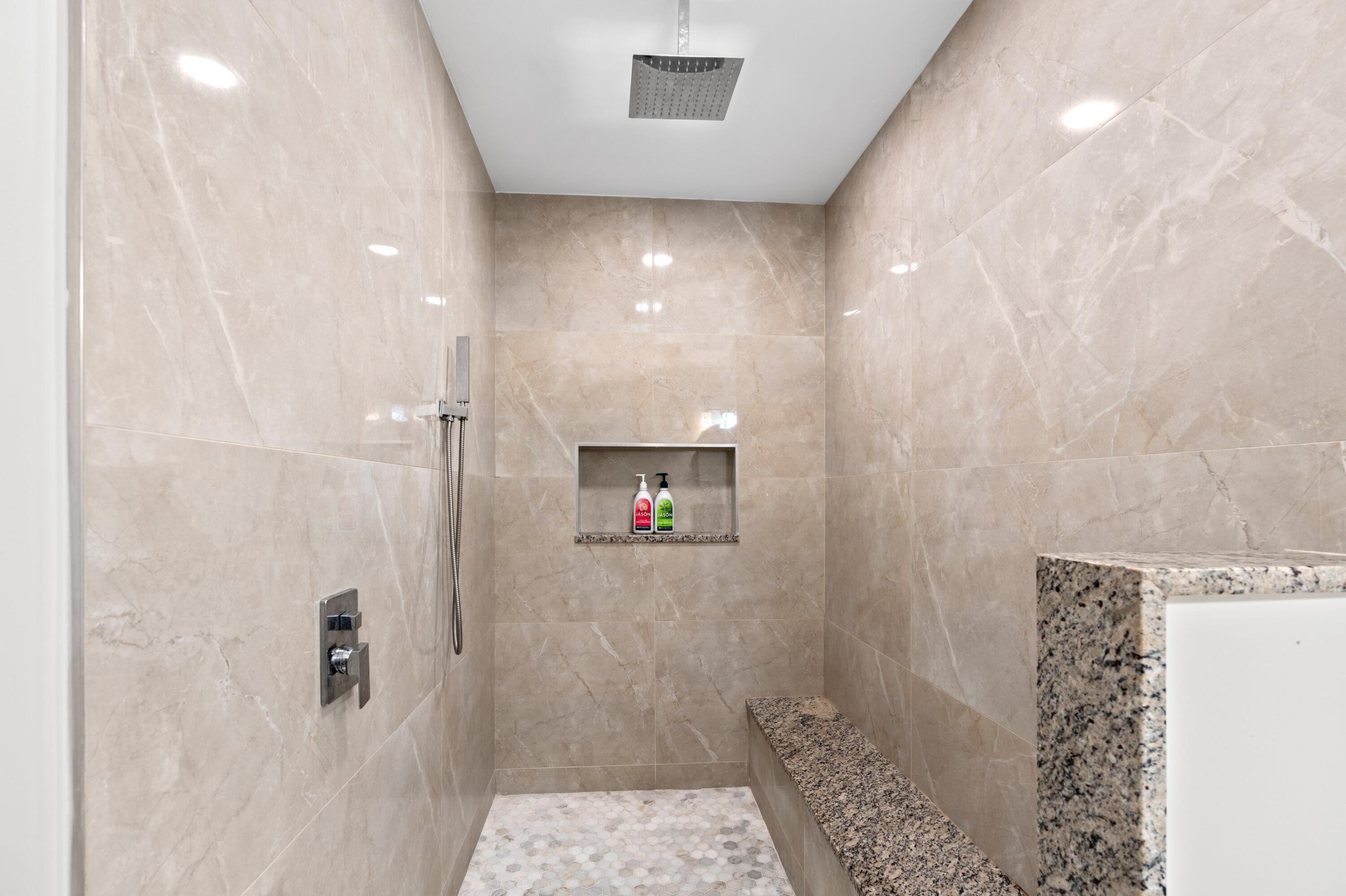 6850 Northwest 2nd Avenue, Unit 1 Boca Raton, FL 33487 - Photo 13 of 31 a bathroom with a shower and a sink