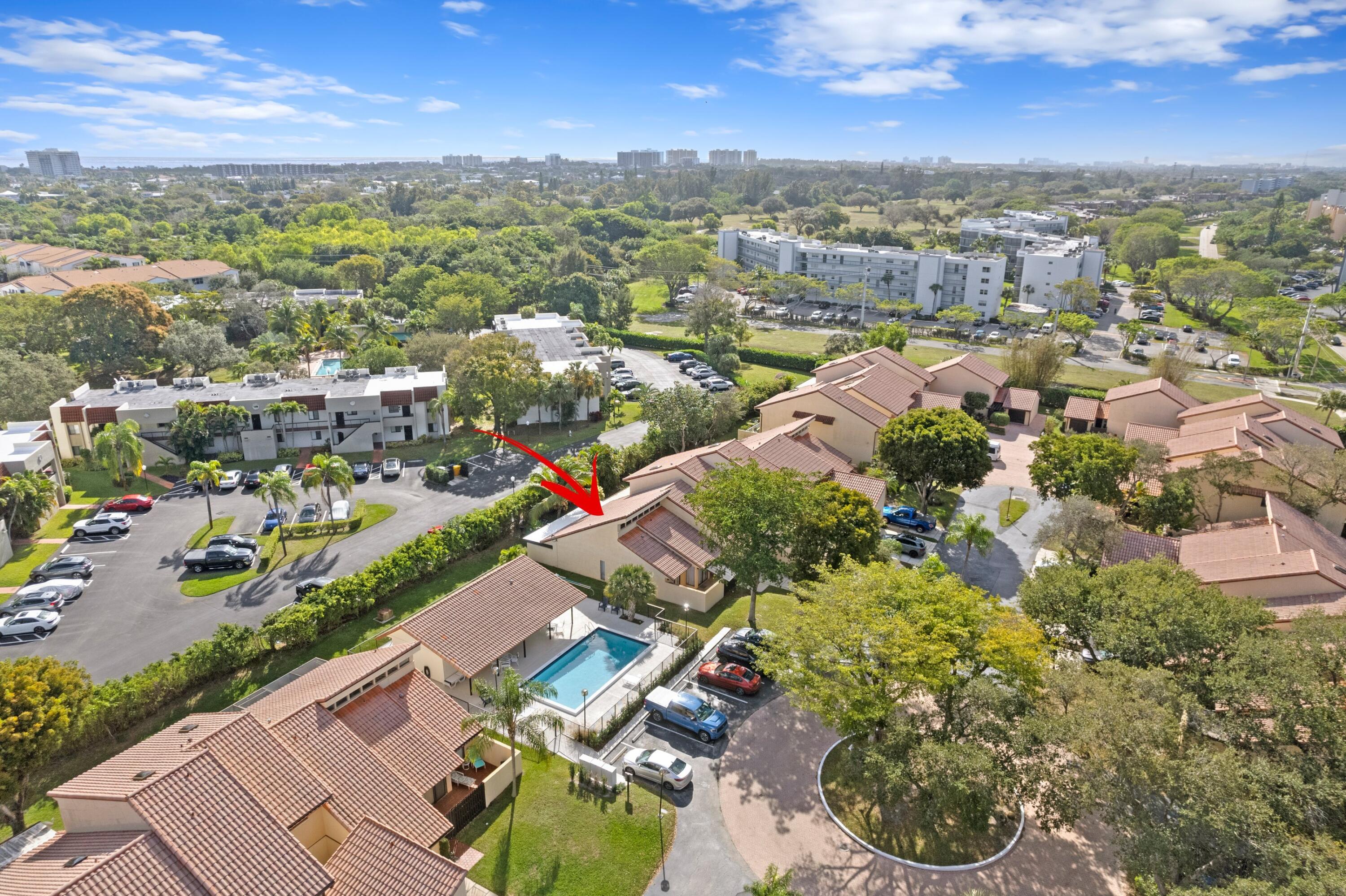 6850 Northwest 2nd Avenue, Unit 1 Boca Raton, FL 33487 - Photo 22 of 31 an aerial view of residential houses with outdoor space