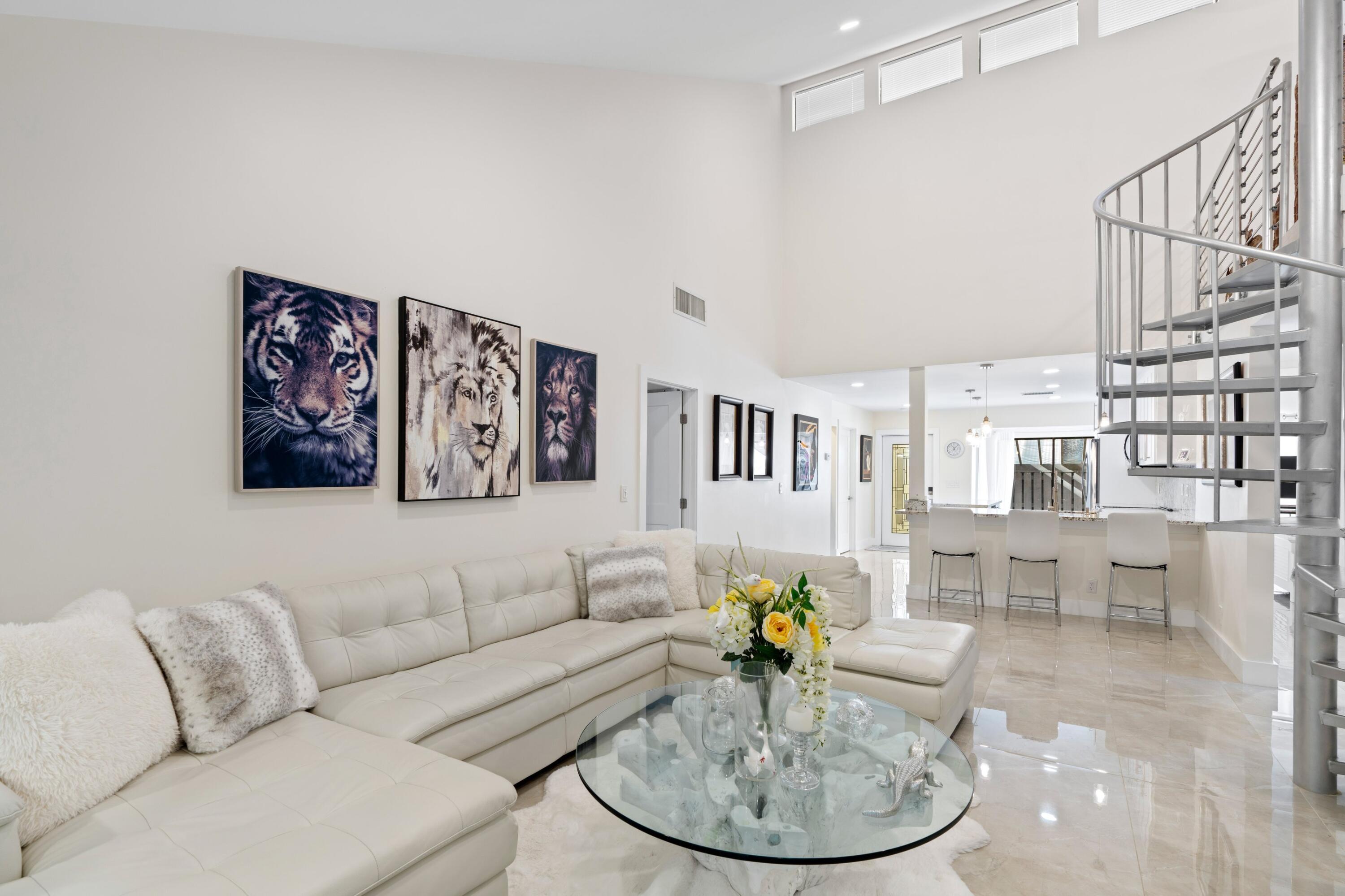 6850 Northwest 2nd Avenue, Unit 1 Boca Raton, FL 33487 - Photo 10 of 31 a living room with furniture and wooden floor