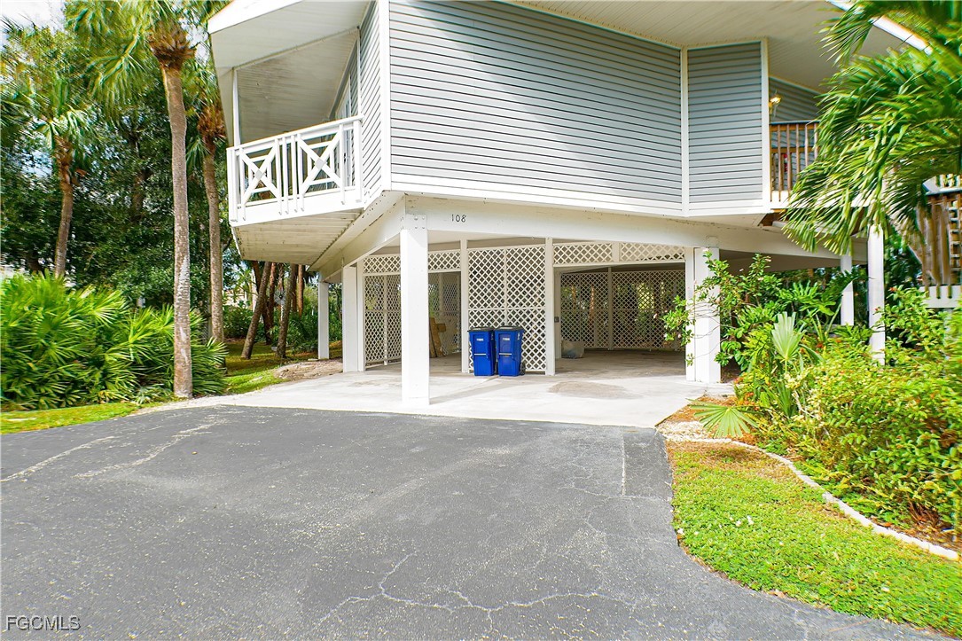 950 Moody Road, Unit 108 North Fort Myers, FL 33903 - Photo 2 of 21 a view of a house with outdoor space