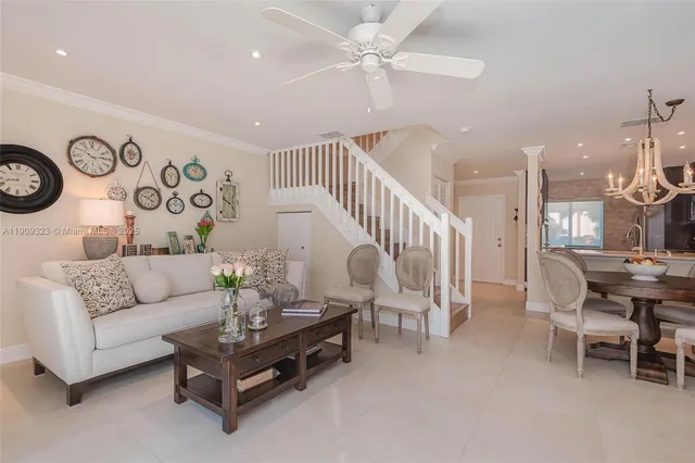 a living room with furniture and a table
