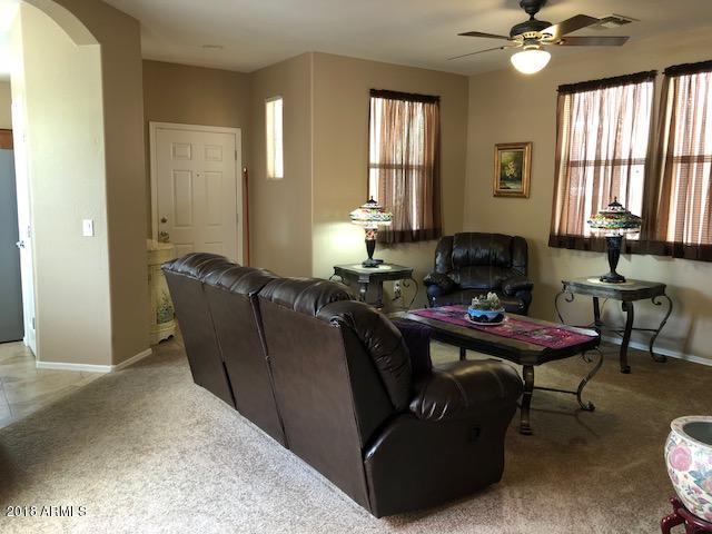 1987 East Del Rio Street Gilbert, AZ 85295 - Photo 5 of 28 a living room with furniture and window