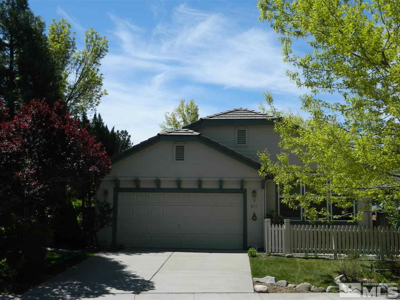 869 Caughlin Glen Reno, NV 89519 - Photo 1 of 1 a front view of a house with a yard