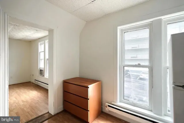 a view of an empty room and window