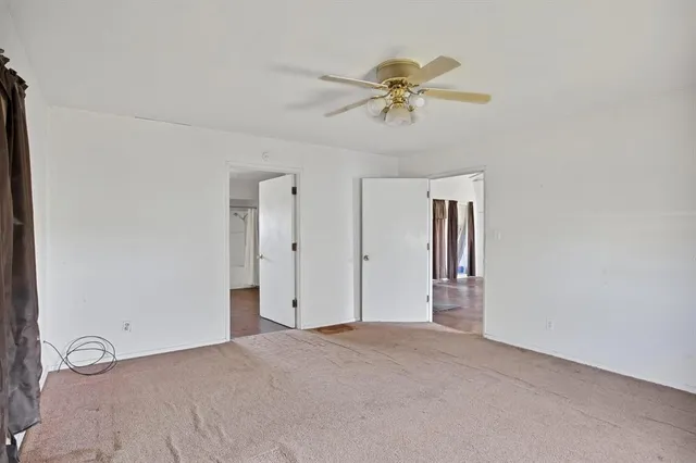a view of a bathroom with closet area