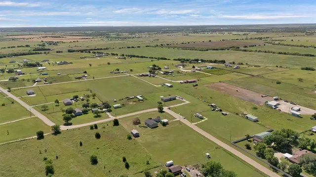 a view of a city with an ocean