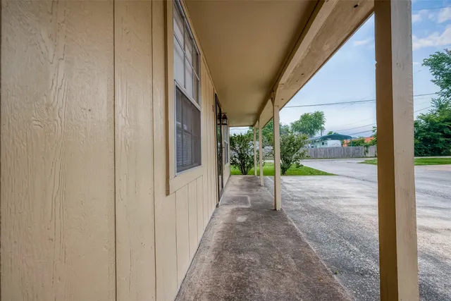 a view of a house with a street