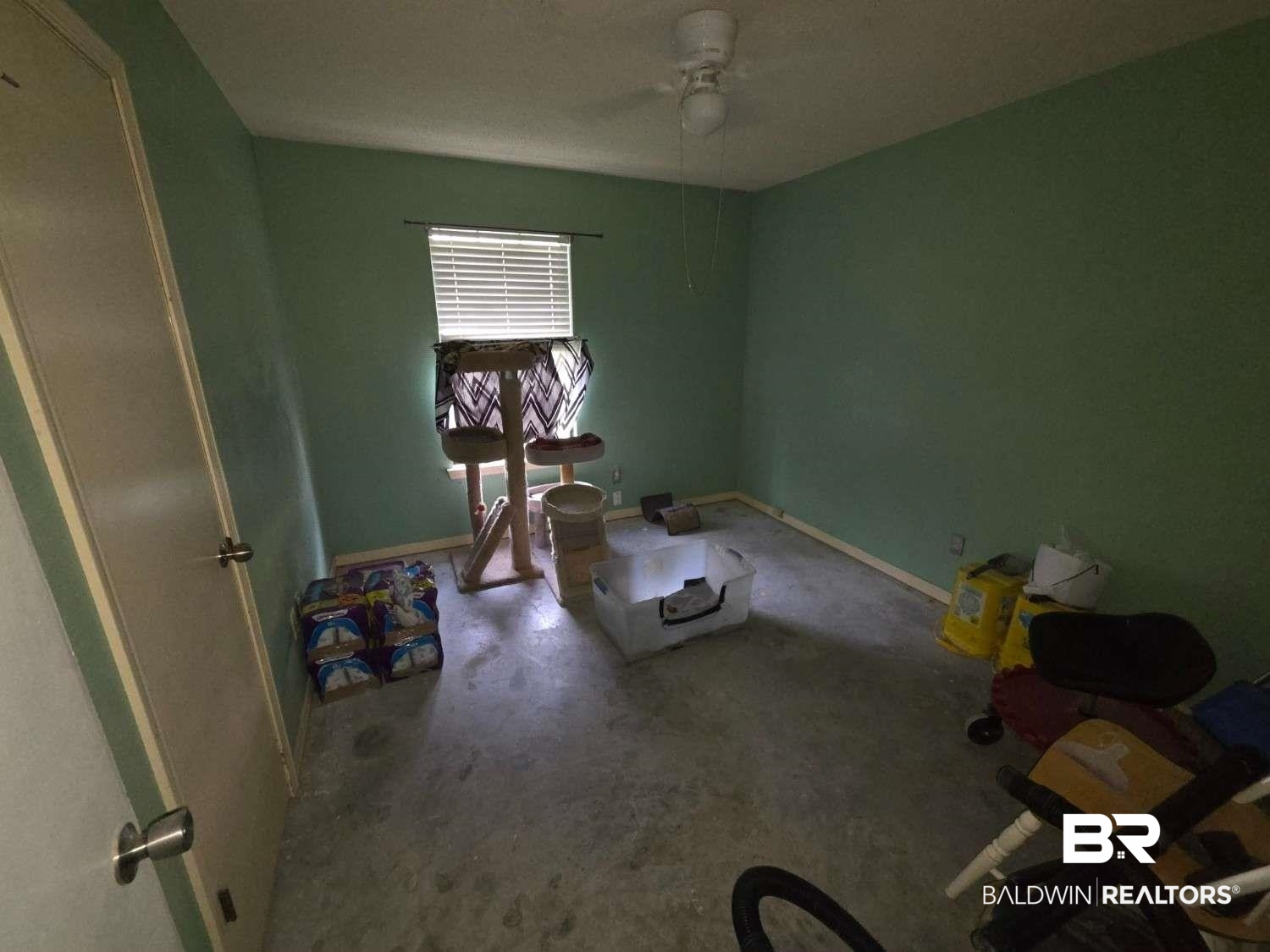 5120 West Celtic Drive Mobile, AL 36619 - Photo 17 of 27 Unfurnished bedroom featuring baseboards