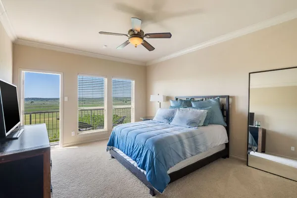 an aerial view of a house with parking space