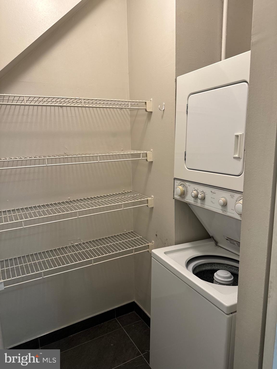 222 Church Street, Unit 5B Philadelphia, PA 19106 - Photo 13 of 15 a bathroom with a washer and dryer