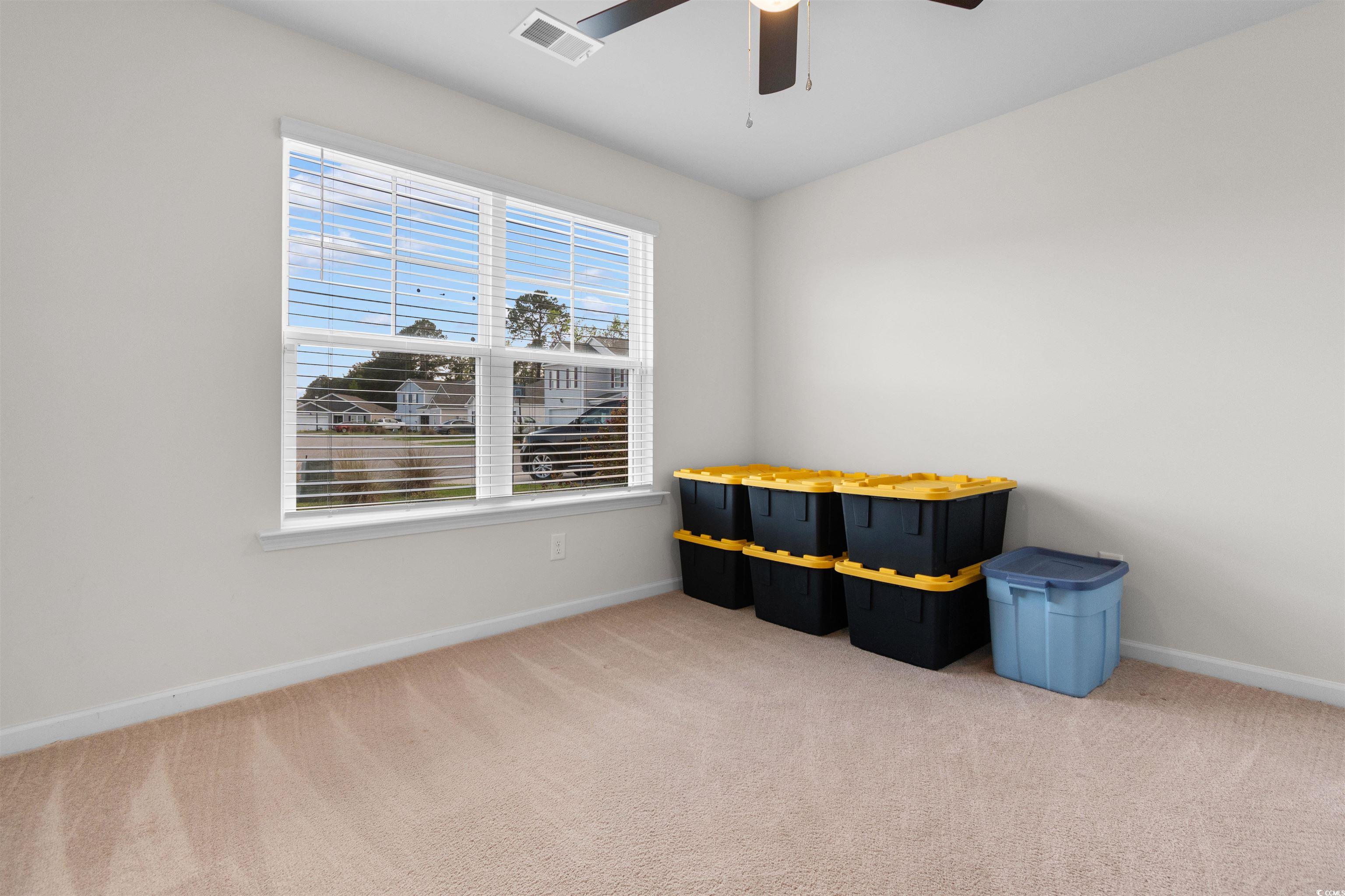824 Twickenham Loop Longs, SC 29568 - Photo 14 of 27 Interior space with a ceiling fan, carpet floors,