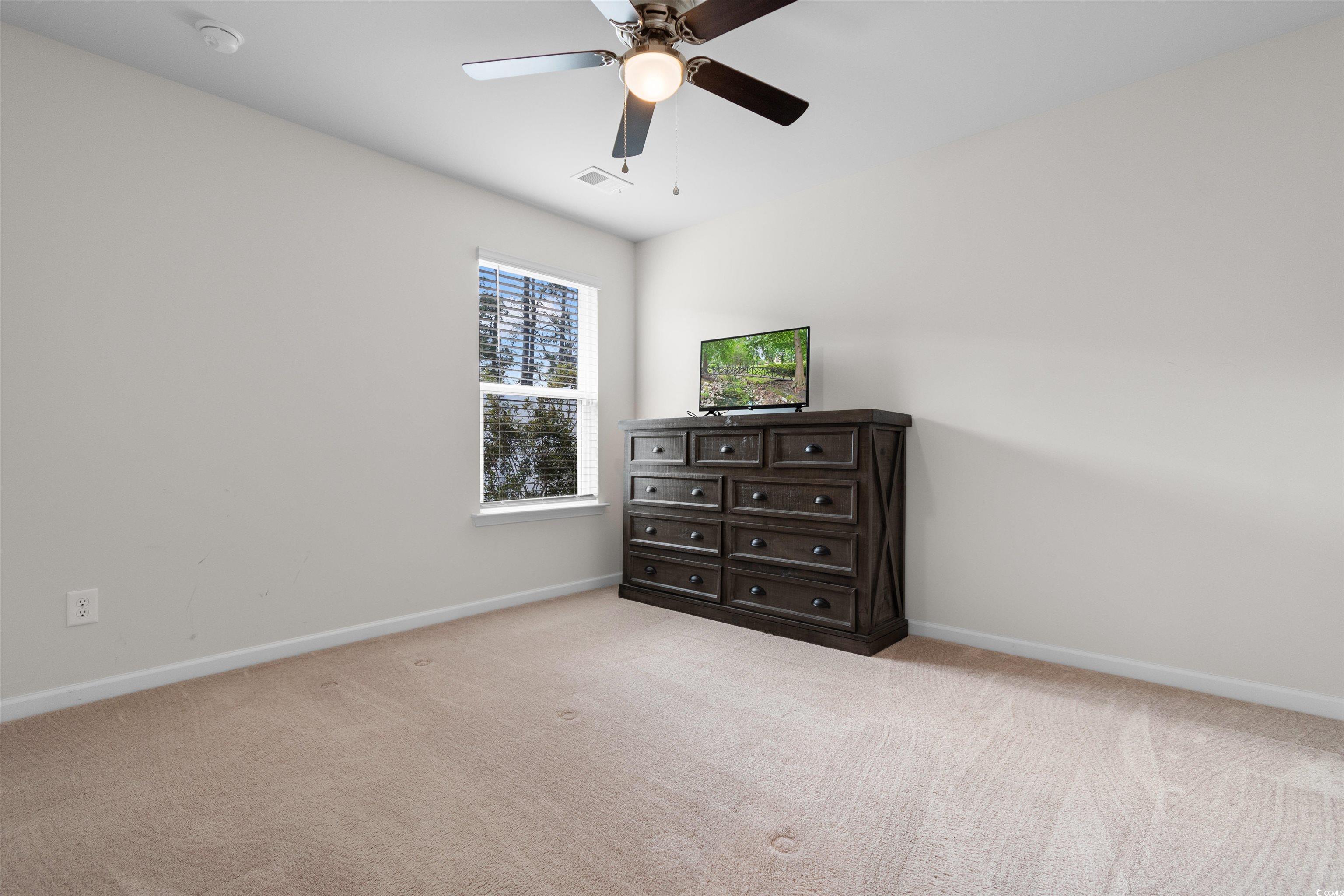 824 Twickenham Loop Longs, SC 29568 - Photo 18 of 27 Bedroom featuring baseboards, visible vents, and c