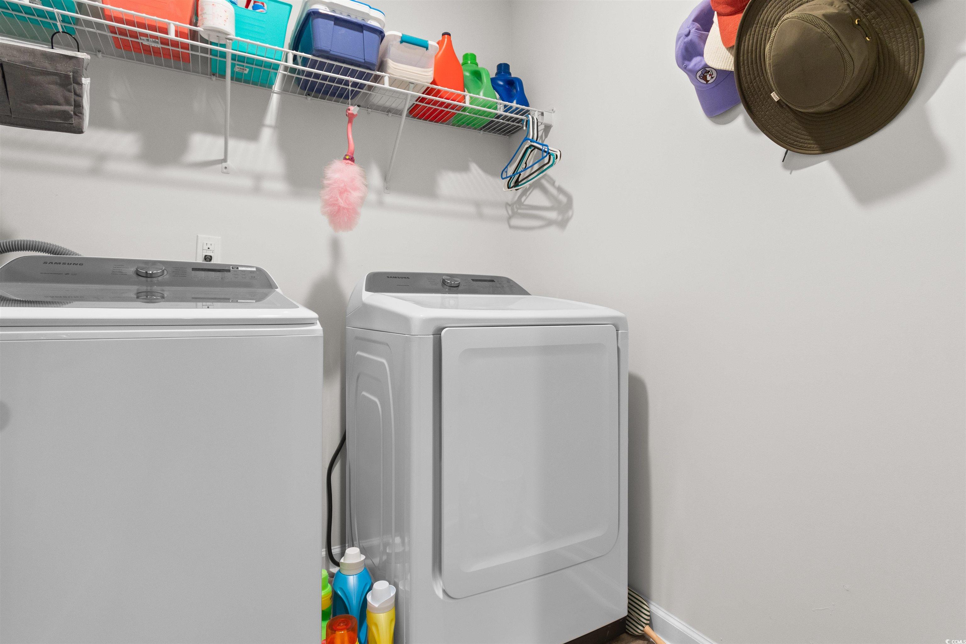 824 Twickenham Loop Longs, SC 29568 - Photo 19 of 27 Laundry room featuring baseboards, washer and drye