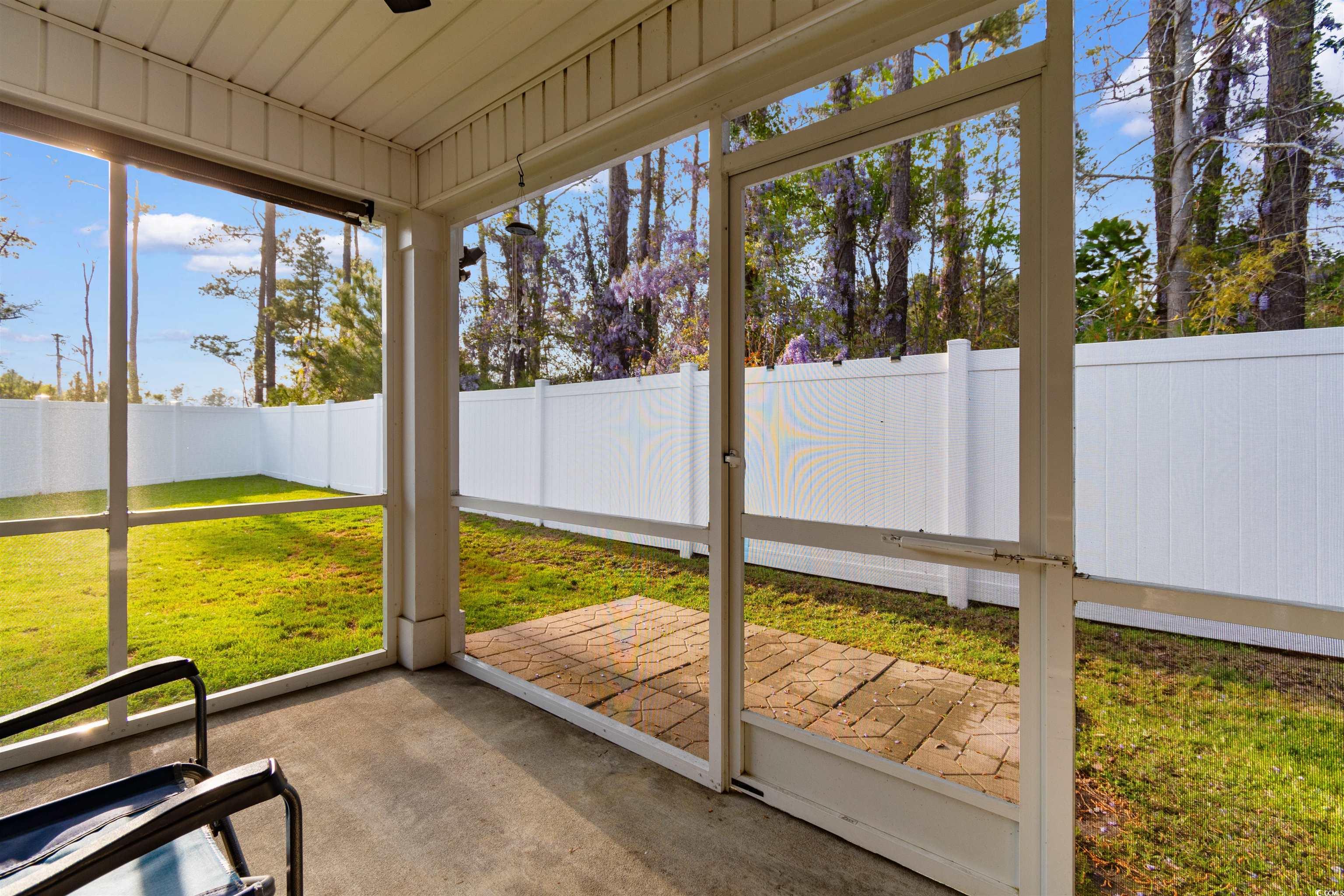 824 Twickenham Loop Longs, SC 29568 - Photo 20 of 27 Unfurnished sunroom featuring a wealth of natural