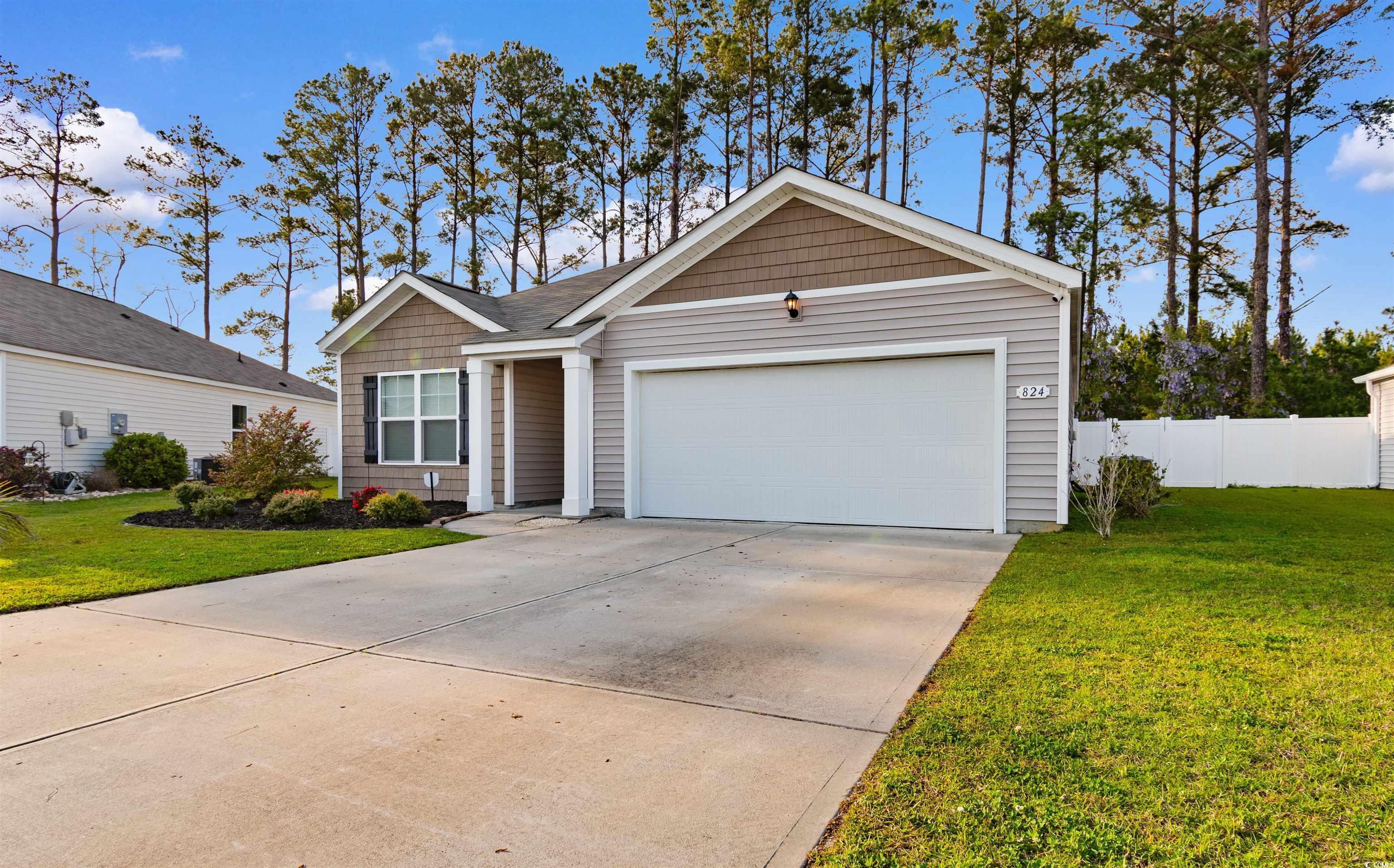 824 Twickenham Loop Longs, SC 29568 - Photo 25 of 27 Single story home with driveway, an attached garag