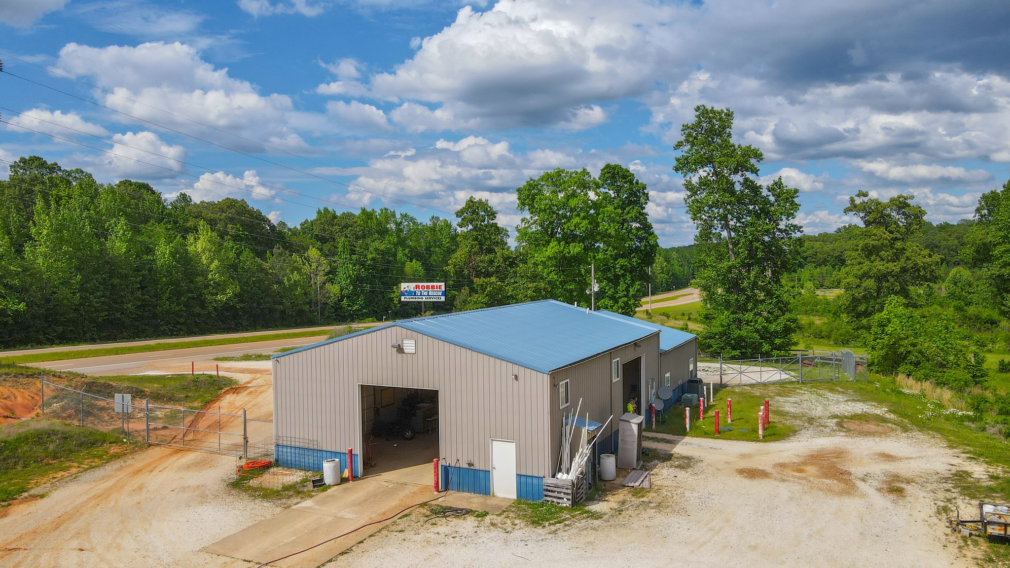 10610 Highway 79 Springville, TN 38256 - Photo 12 of 60 a view of a house with a yard and sitting area