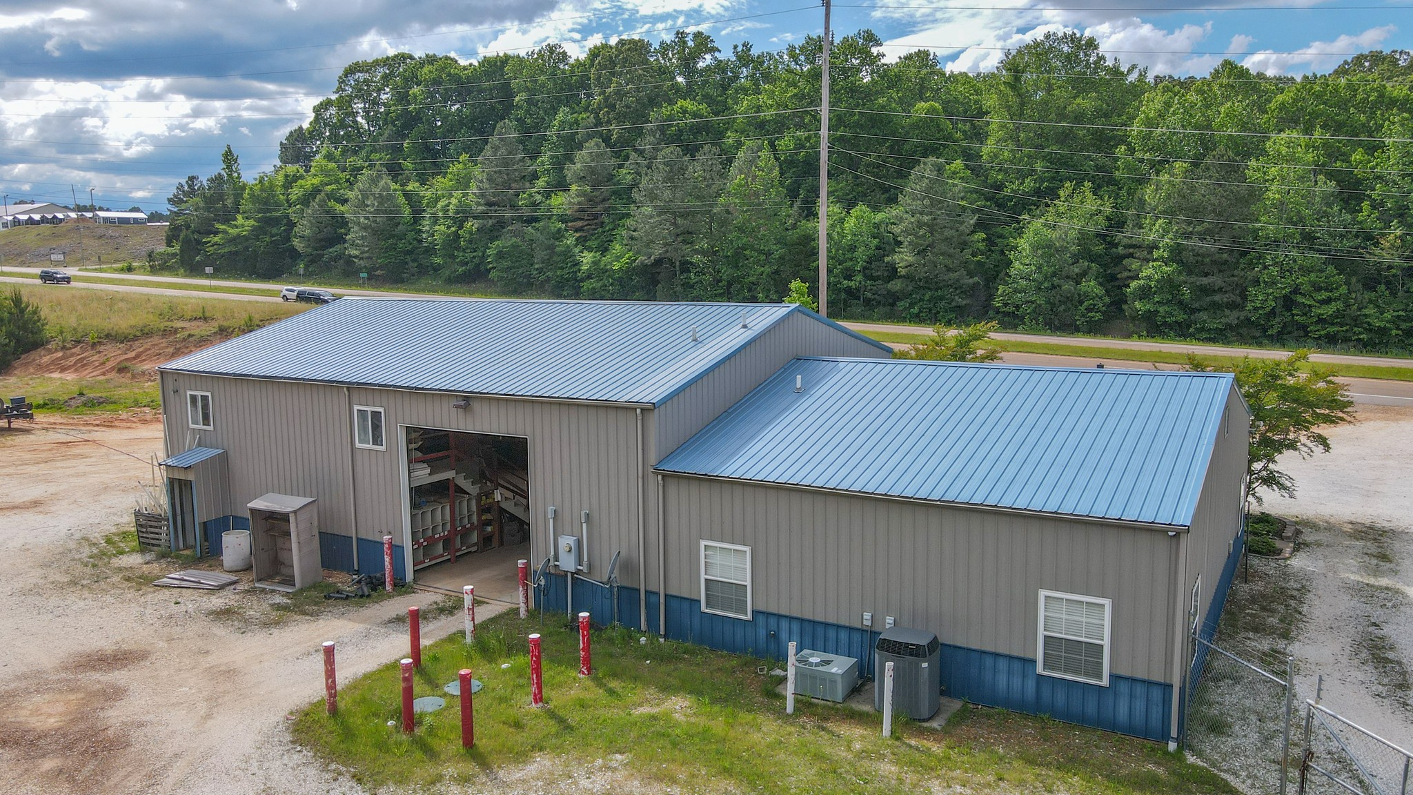 10610 Highway 79 Springville, TN 38256 - Photo 13 of 60 an aerial view of a house with swimming pool and a yard
