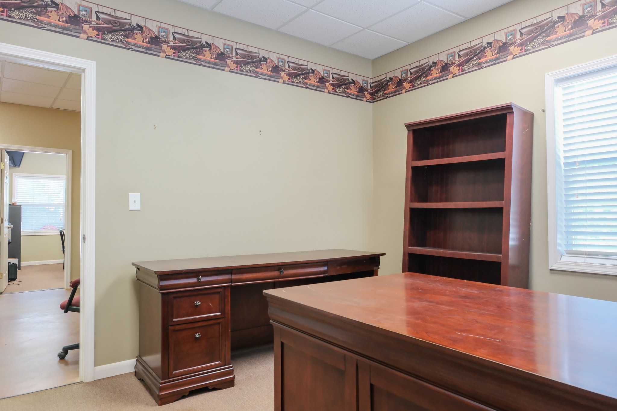 10610 Highway 79 Springville, TN 38256 - Photo 24 of 60 a room with a table and a window