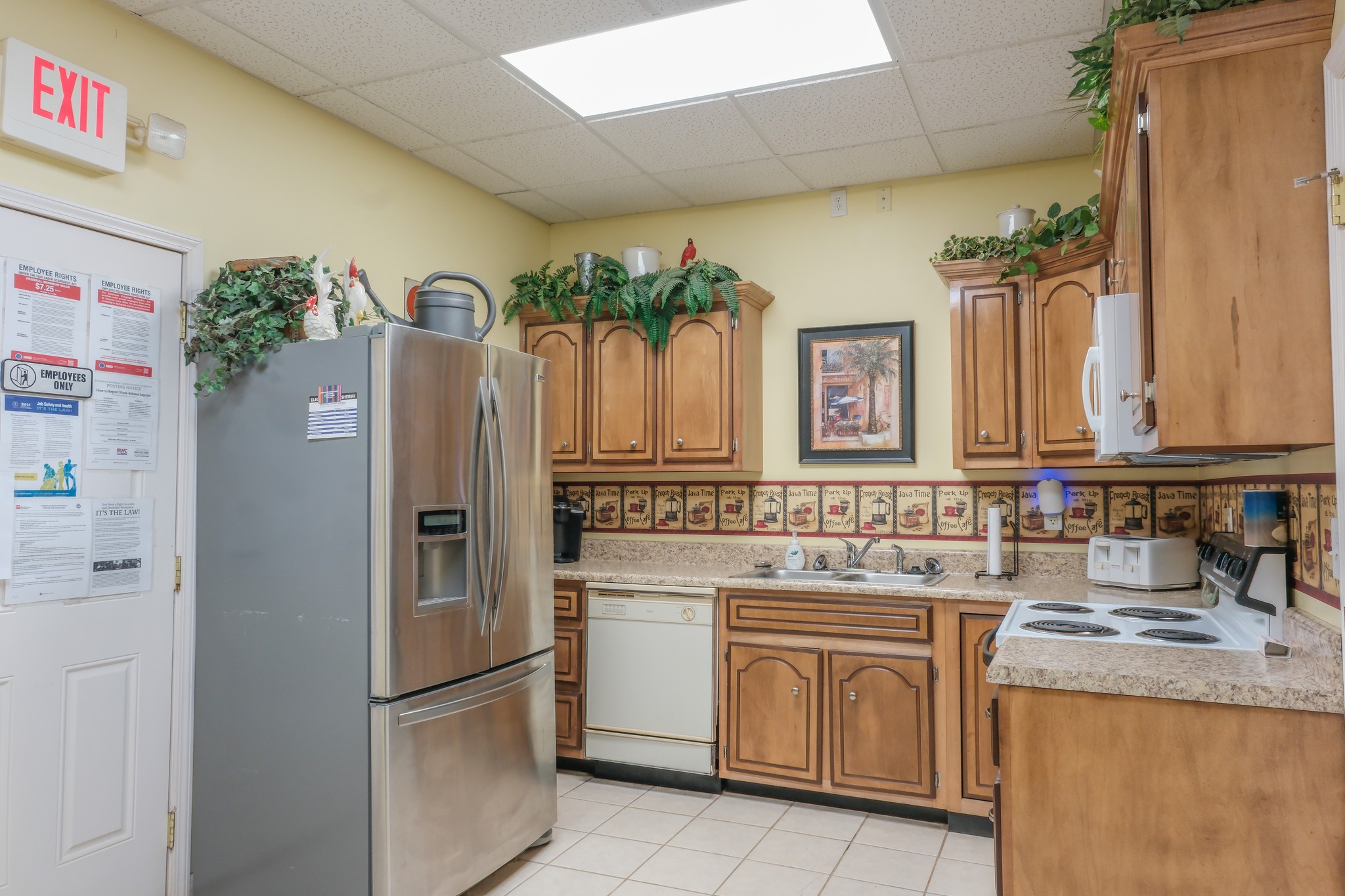 10610 Highway 79 Springville, TN 38256 - Photo 31 of 60 a kitchen with a refrigerator and a sink