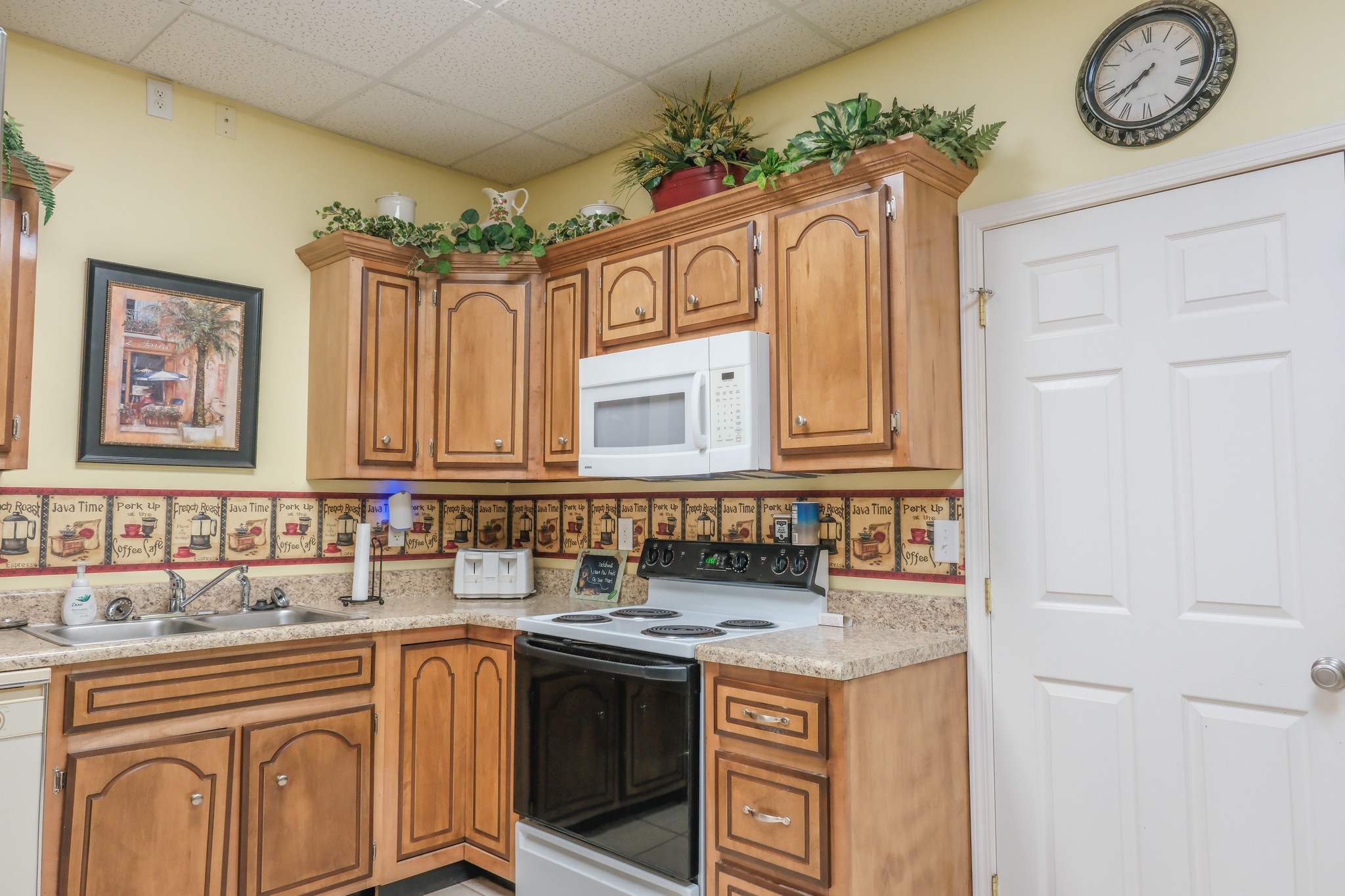 10610 Highway 79 Springville, TN 38256 - Photo 32 of 60 a kitchen with stainless steel appliances granite countertop a stove and a sink